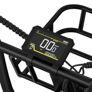 Digital speedometer on a black bike frame with visible brand logo.